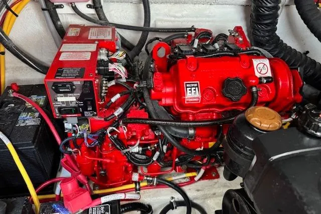 Slide: The Image of Engine compartment of a 2021 Monterey 335 Sport Yacht with red EFI system. - 19