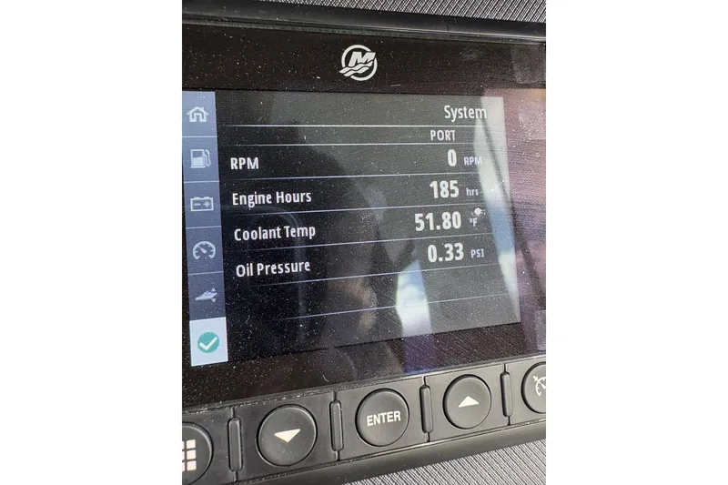 Slide: The Image of Dashboard display of a 2021 Monterey 335 Sport Yacht showing engine metrics. - 28