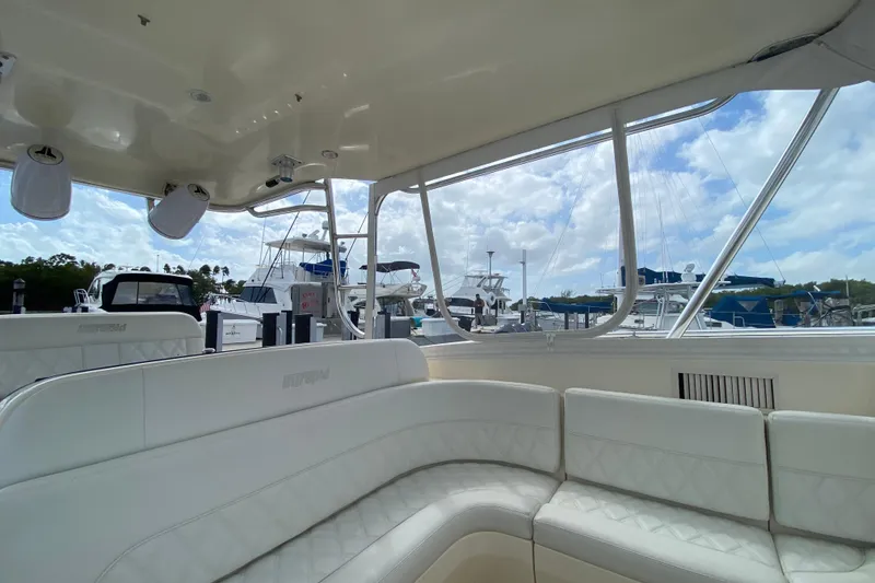 Slide: The Image of Interior view of a 2006 Intrepid 377 boat docked at a marina. - 28