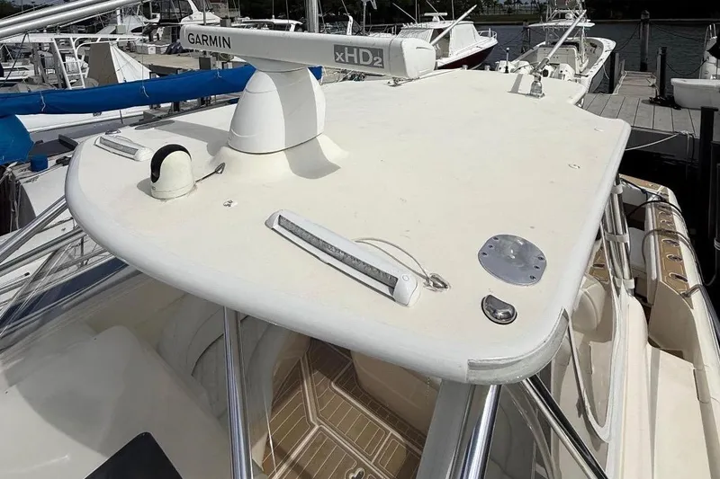 Slide: The Image of 2006 Intrepid 377 boat with Garmin xHD2 radar on deck, docked at marina. - 34