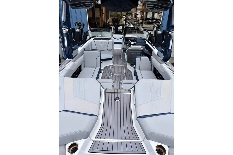 Slide: The Image of 2023 Nautique Super Air Nautique G23 Paragon interior with luxurious seating and sleek design. - 4