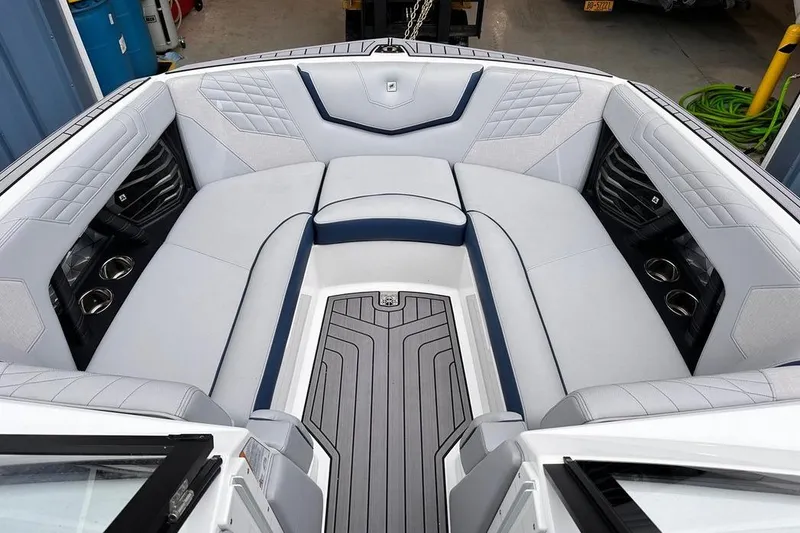 Slide: The Image of 2023 Nautique Super Air Nautique G23 Paragon interior with luxurious seating and cup holders. - 6