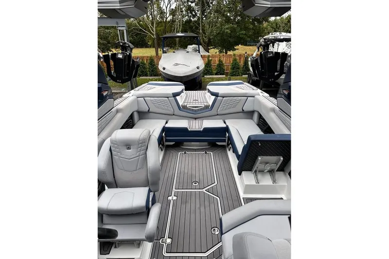 Slide: The Image of 2023 Nautique Super Air Nautique G23 Paragon interior with luxurious seating and sleek design. - 7