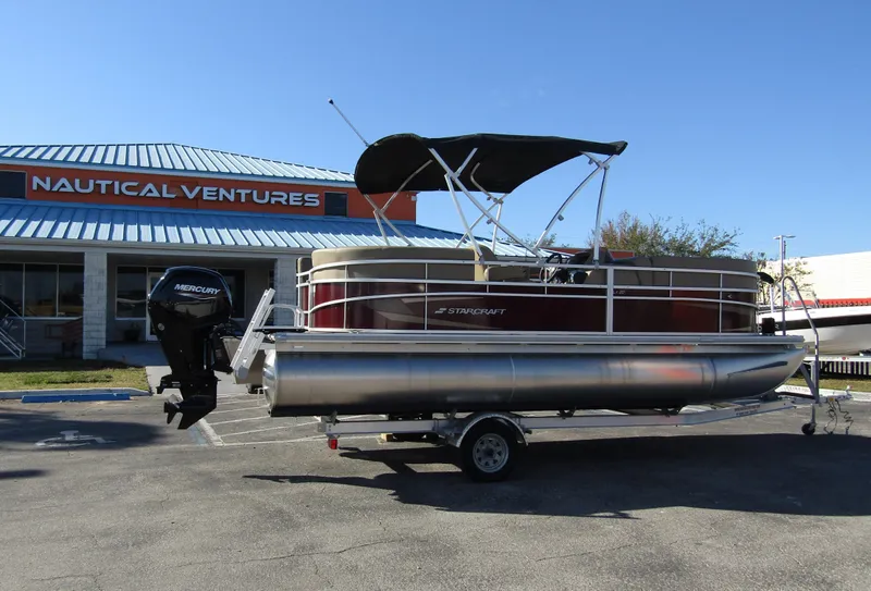 Slide: The Image of 2024 Starcraft LX 20 R pontoon boat on trailer at Nautical Ventures. - 5