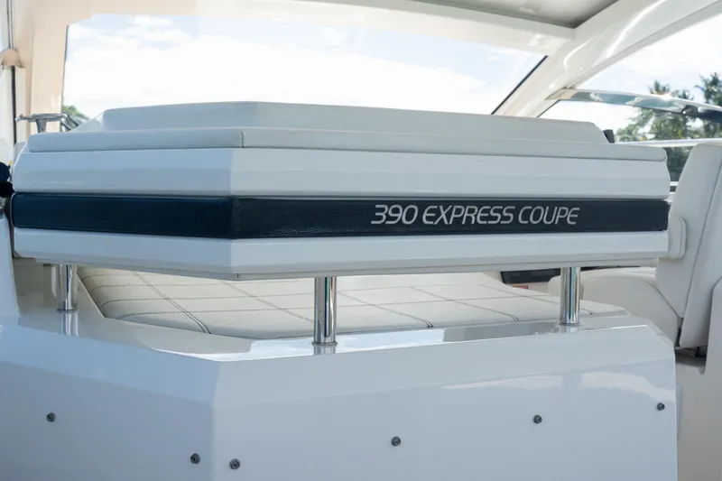 Slide: The Image of 2018 Cruisers Yachts 390 Express Coupe radar system under a clear blue sky. - 22