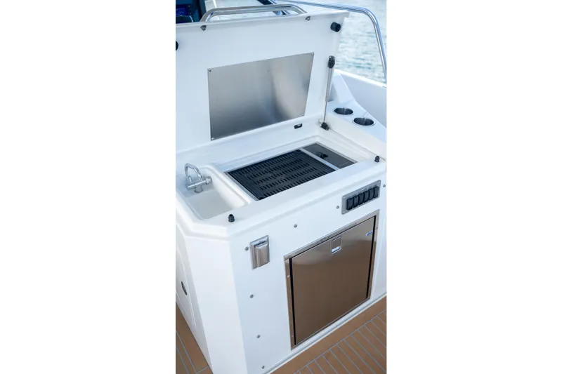 Slide: The Image of 2018 Cruisers Yachts 390 Express Coupe steps with teak-style decking. - 34