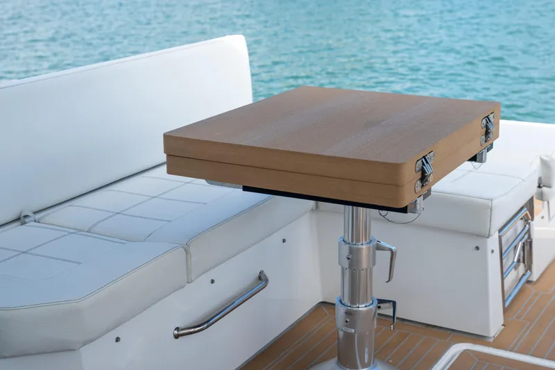 Slide: The Image of 2018 Cruisers Yachts 390 Express Coupe interior with stainless steel appliances and modern design. - 32