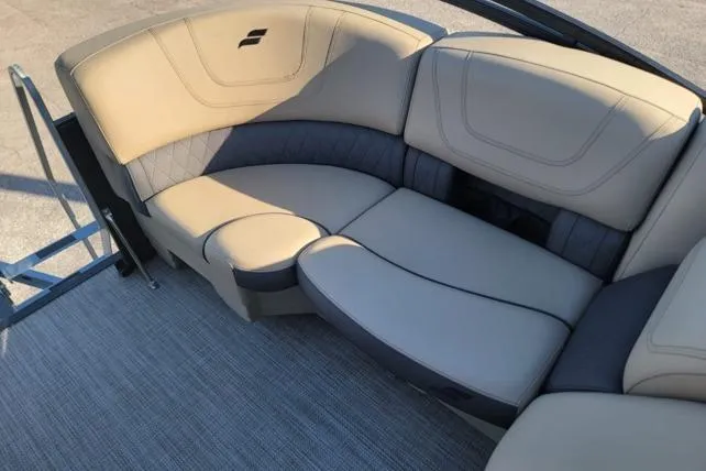 Slide: The Image of 2024 Starcraft SLS 1 boat interior with beige and gray seating. - 3