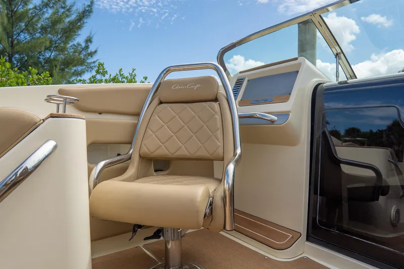 Slide: The Image of Luxurious interior of 2017 Chris-Craft Corsair 28 Heritage Edition boat with tan leather seating. - 46