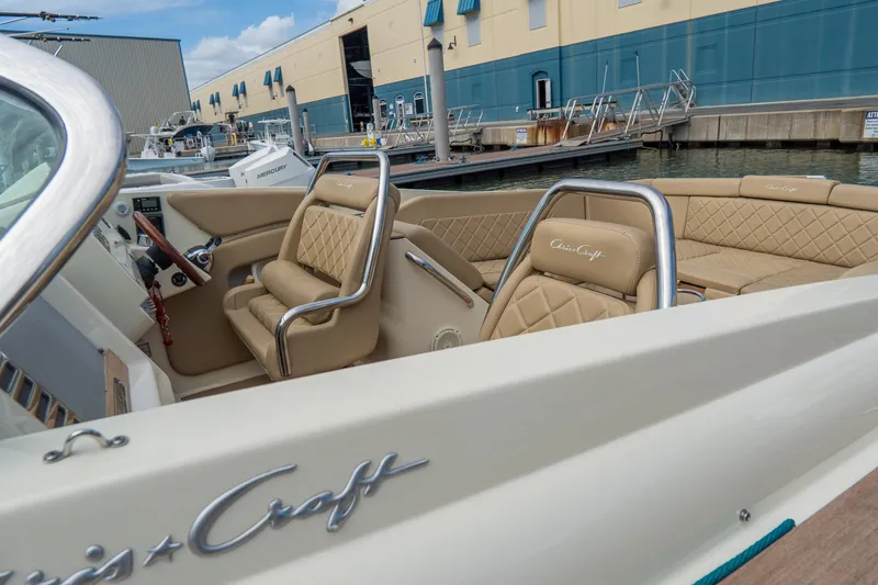 Slide: The Image of 2017 Chris-Craft Corsair 28 Heritage Edition boat interior with tan leather seating. - 52