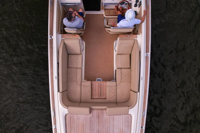 Slide: The Image of Overhead view of 2017 Chris-Craft Corsair 28 Heritage Edition boat interior on water. - 53