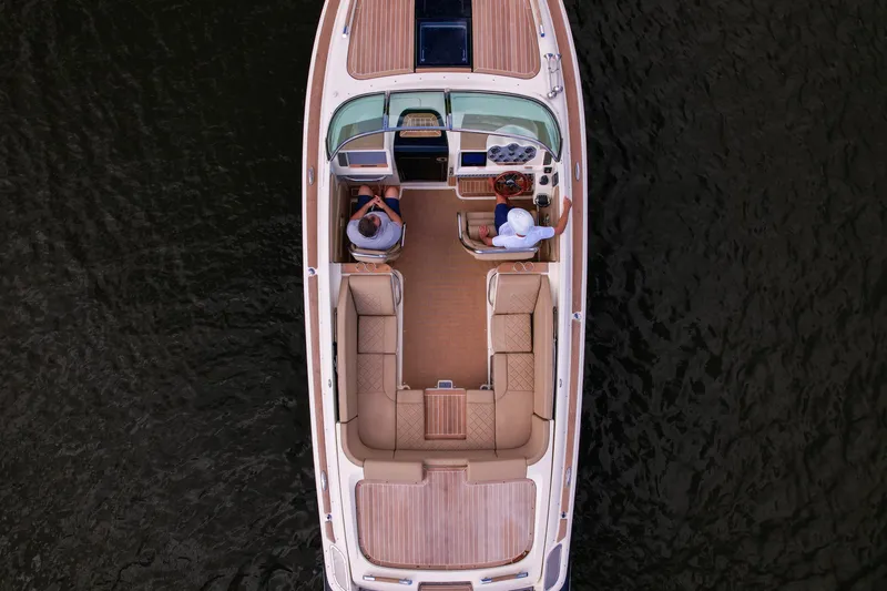Slide: The Image of 2017 Chris-Craft Corsair 28 Heritage Edition boat, aerial view on water. - 6