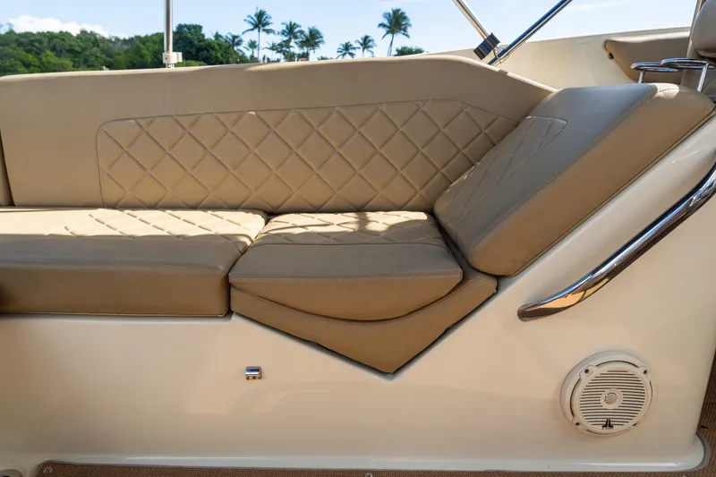 Slide: The Image of Luxurious seating on 2017 Chris-Craft Corsair 28 Heritage Edition boat, featuring diamond-stitched upholstery. - 60