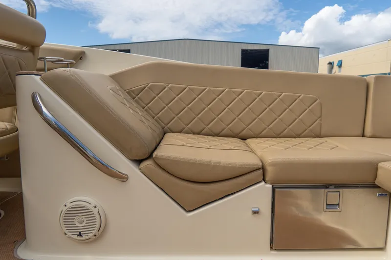Slide: The Image of Luxurious tan seating on 2017 Chris-Craft Corsair 28 Heritage Edition boat. - 62