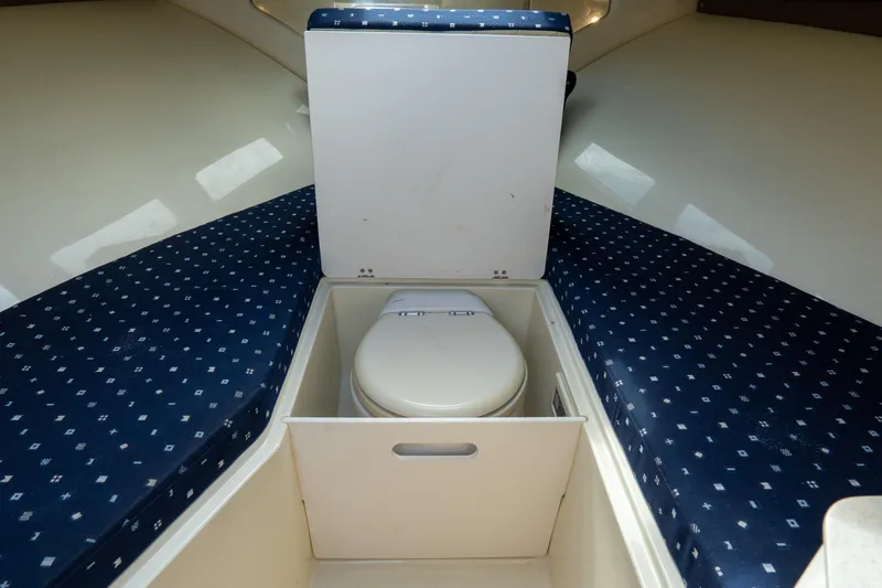 Slide: The Image of 2017 Chris-Craft Corsair 28 Heritage Edition cabin with compact marine toilet. - 69