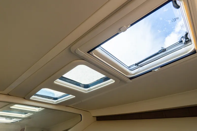 Slide: The Image of 2017 Chris-Craft Corsair 28 Heritage Edition cabin skylights with open hatches. - 74