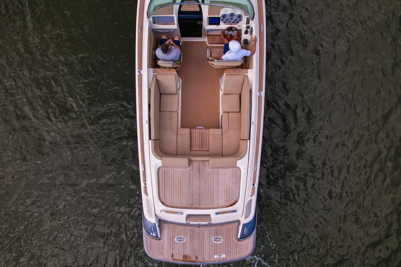 Slide: The Image of 2017 Chris-Craft Corsair 28 Heritage Edition boat, aerial view on water. - 90