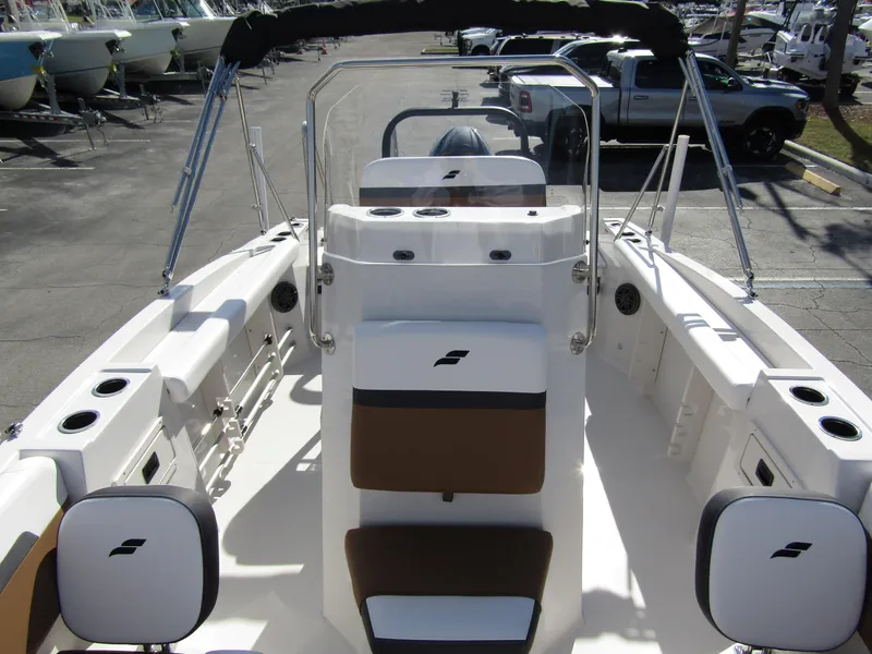 Slide: The Image of 2024 Starcraft SVX 191 OB CC boat interior with seating and console. - 15