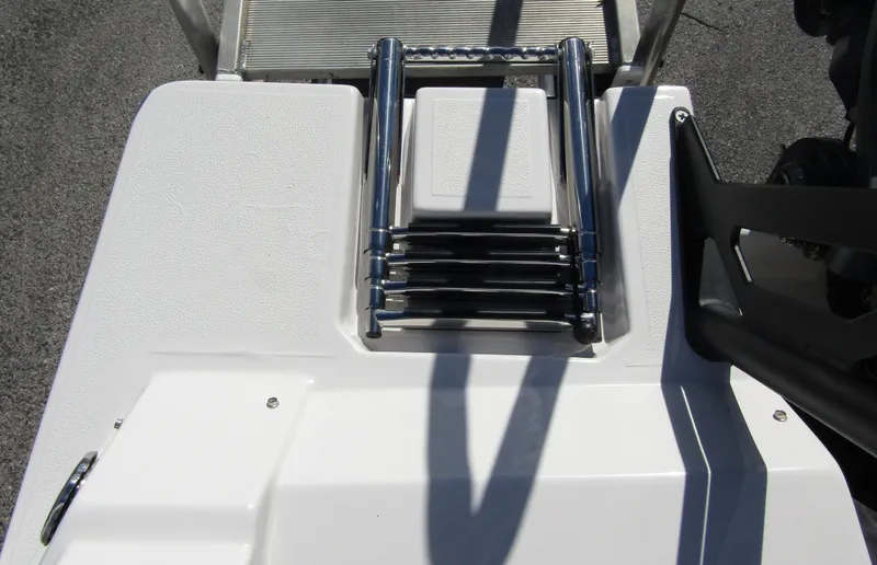 Slide: The Image of 2024 Starcraft SVX 191 OB CC boat with a stainless steel swim ladder. - 37