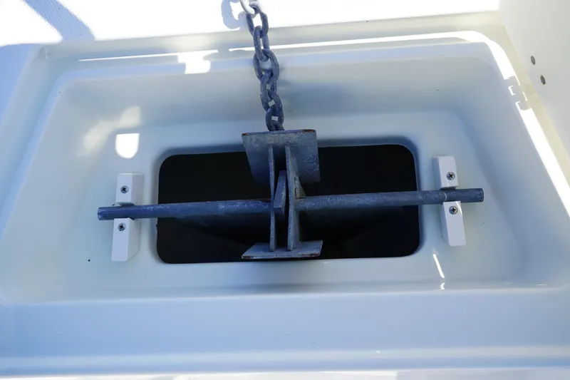 Slide: The Image of Anchor storage compartment on a 2002 Fish Hawk 230 CC boat. - 35