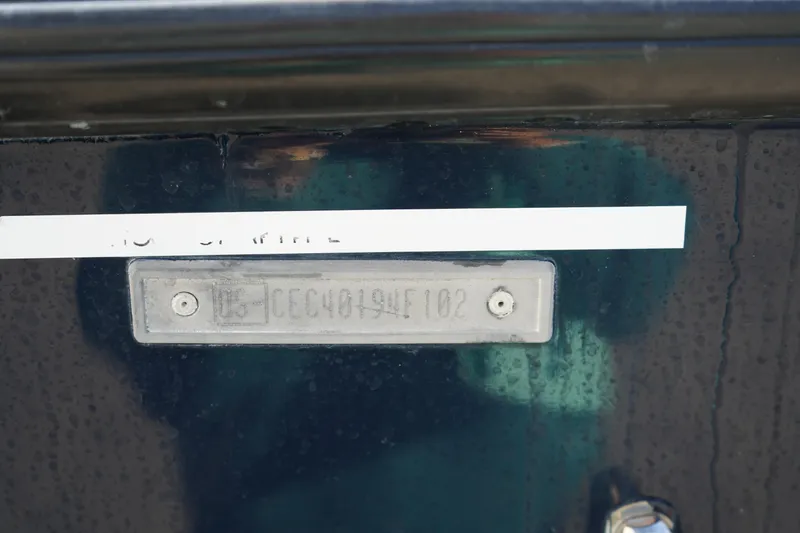 Slide: The Image of 2002 Fish Hawk 230 CC boat hull identification number plate. - 36
