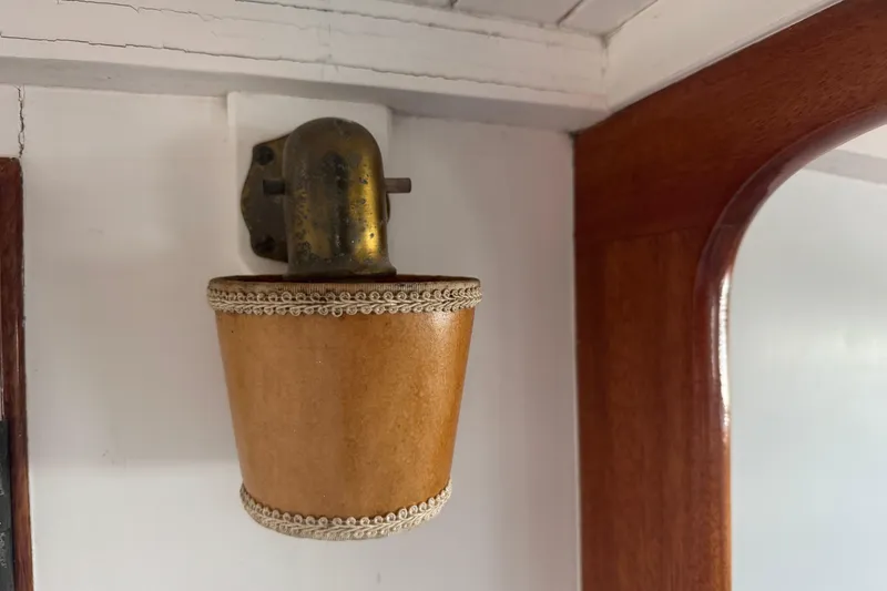 Slide: The Image of Vintage 1940 Elco Cruisette interior light fixture with brass and leather details. - 16