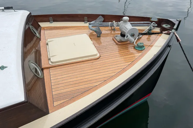 Slide: The Image of 1940 Elco Cruisette boat deck with anchor and wooden finish. - 3