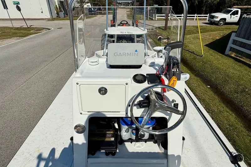 Slide: The Image of 2010 Shallow Sport 15 Classic boat console with Garmin navigation system. - 10