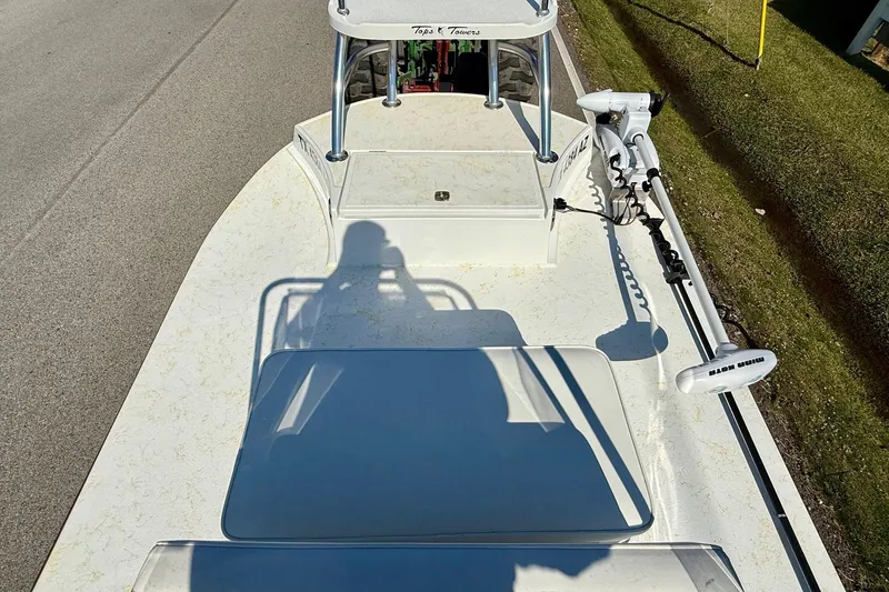 Slide: The Image of 2010 Shallow Sport 15 Classic boat with trolling motor, shadow on deck. - 12