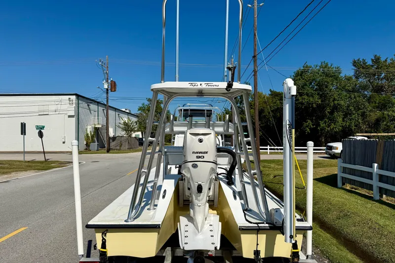 Slide: The Image of 2010 Shallow Sport 15 Classic boat with Evinrude 90 engine on trailer. - 3
