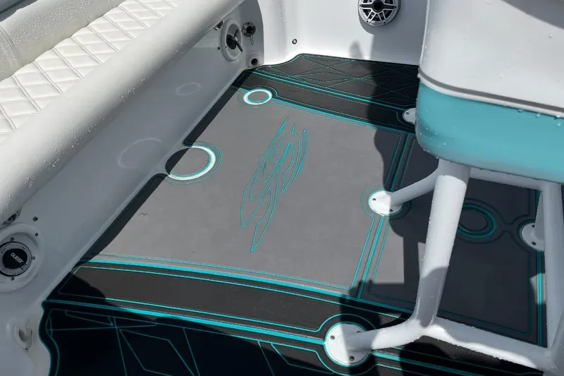 Slide: The Image of 2021 Glasstream 255 Pro-XS boat interior with custom flooring and seating. - 25