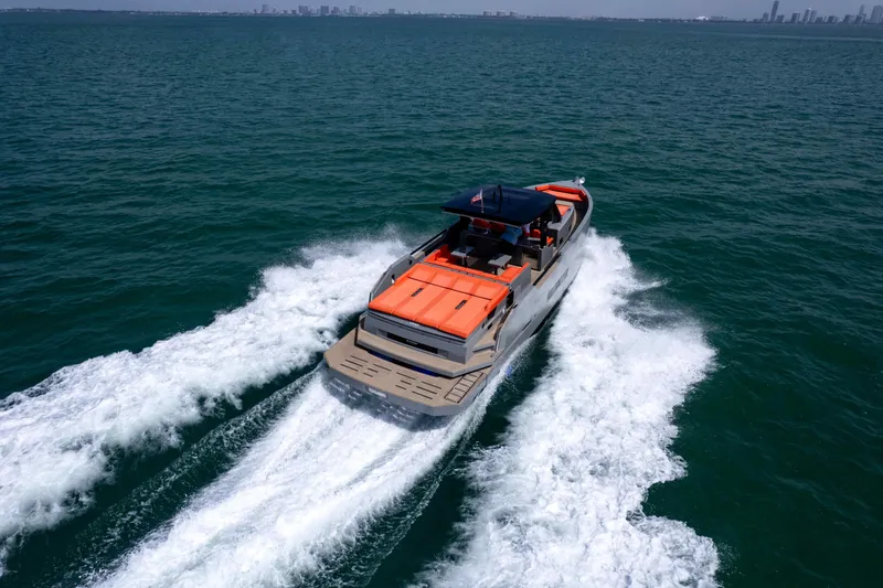 Slide: The Image of 2023 De Antonio Yachts D50 cruising on open water, showcasing sleek design and powerful performance. - 10