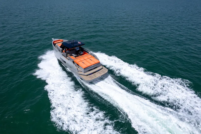 Slide: The Image of 2023 De Antonio Yachts D50 cruising on open water, showcasing sleek design and powerful performance. - 37