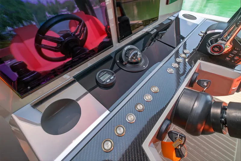 Slide: The Image of 2023 De Antonio Yachts D50 helm with modern controls and sleek design. - 47