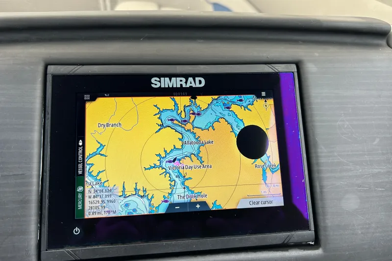 Slide: The Image of Simrad navigation display on 2023 Bennington 22 SSR boat, showing a detailed lake map. - 19
