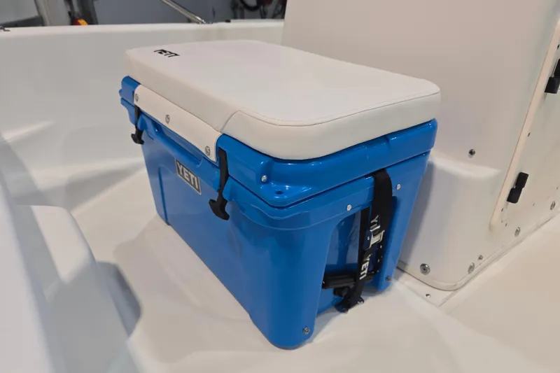 Slide: The Image of Blue YETI cooler with cushioned seat on 1999 Boston Whaler Dauntless 14 boat. - 32