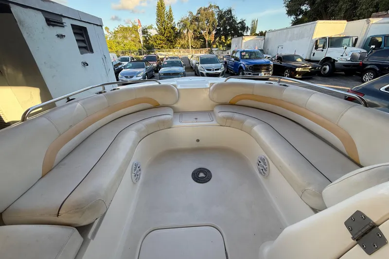Slide: The Image of 2016 Hurricane SunDeck Sport 232 OB boat interior with spacious seating and storage. - 34