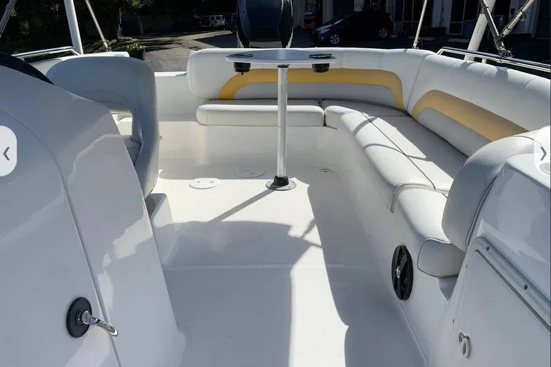 Slide: The Image of 2016 Hurricane SunDeck Sport 232 OB boat with Mercury Pro XS outboard motor. - 5