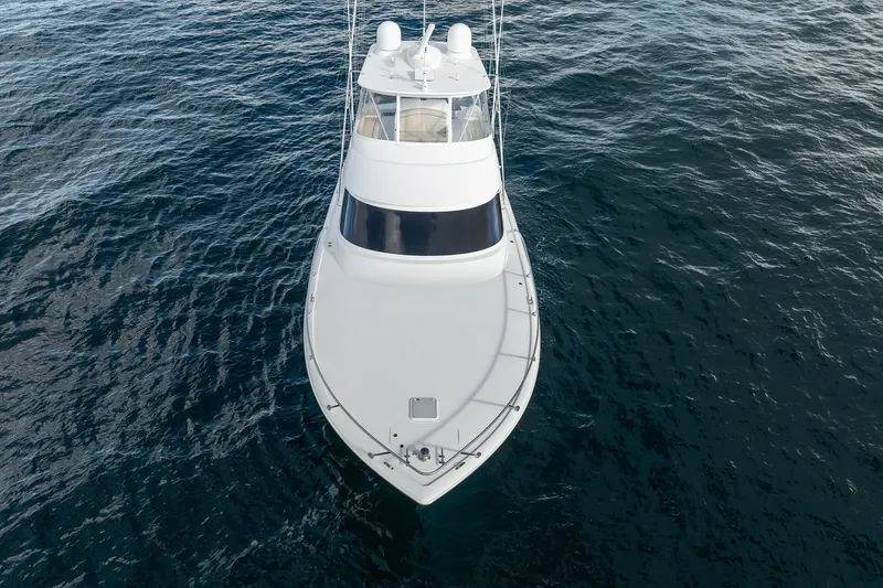 Slide: The Image of Aerial view of 2021 Viking 54 Convertible yacht on open water. - 49