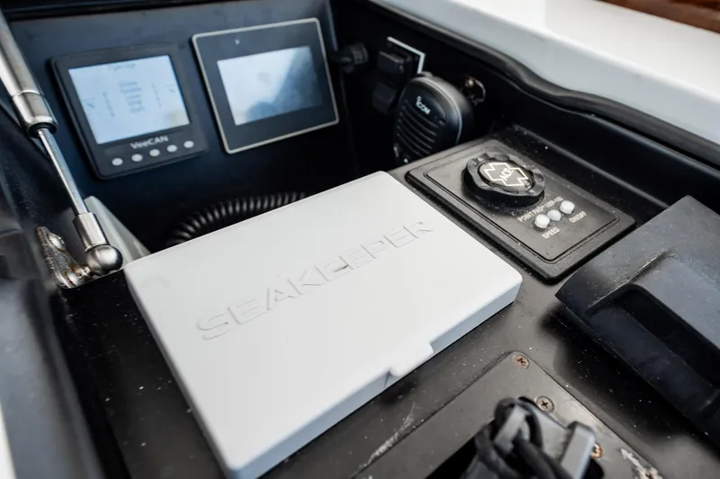 Slide: The Image of Control panel of 2021 Viking 54 Convertible yacht featuring Seakeeper system. - 62