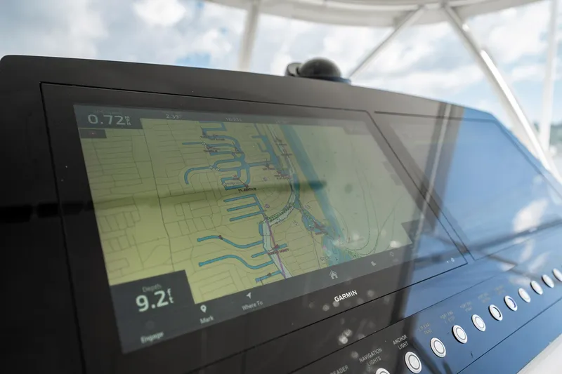 Slide: The Image of Navigation display on 2021 Viking 54 Convertible yacht, showing detailed marine map. - 64