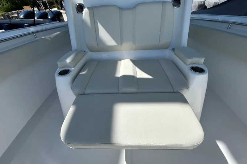 Slide: The Image of Luxurious seating on 2022 Cape Horn 36 boat with cup holders and armrests. - 15