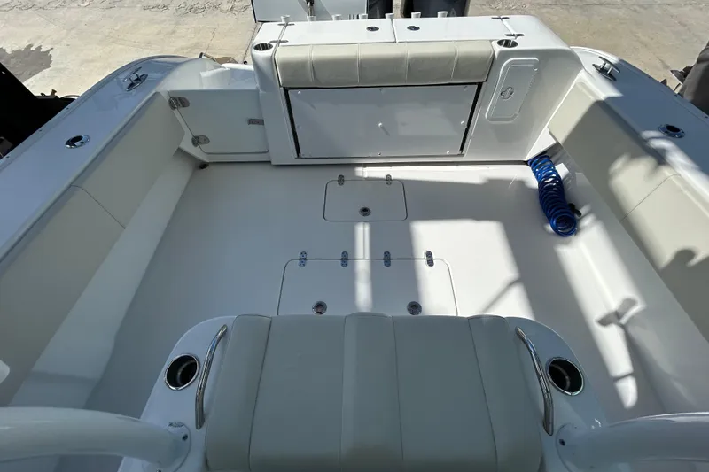 Slide: The Image of 2022 Cape Horn 36 boat interior with spacious seating and storage compartments. - 30