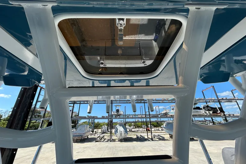 Slide: The Image of View from below the 2022 Cape Horn 36 boat, showcasing its structure and docked surroundings. - 32