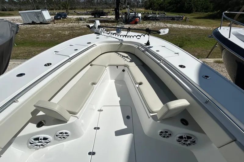 Slide: The Image of 2022 Cape Horn 36 boat interior with cushioned seating and speakers. - 5