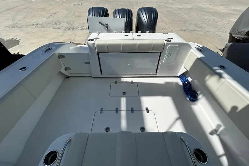 Slide: The Image of 2022 Cape Horn 36 boat interior with dual engines and spacious seating area. - 29
