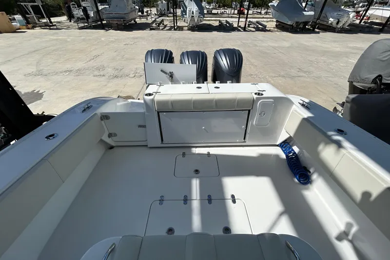 Slide: The Image of 2022 Cape Horn 36 boat interior with dual engines and spacious deck layout. - 31
