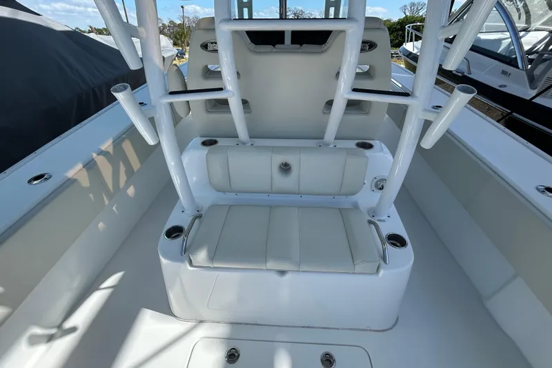 Slide: The Image of 2022 Cape Horn 36 boat interior with white seating and rod holders. - 34