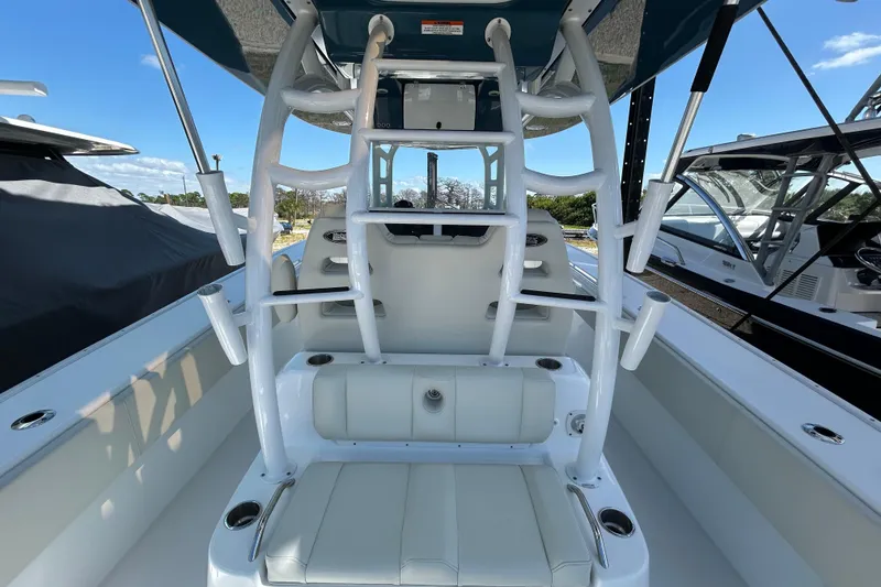 Slide: The Image of 2022 Cape Horn 36 boat interior with seating and rod holders, showcasing modern design. - 35