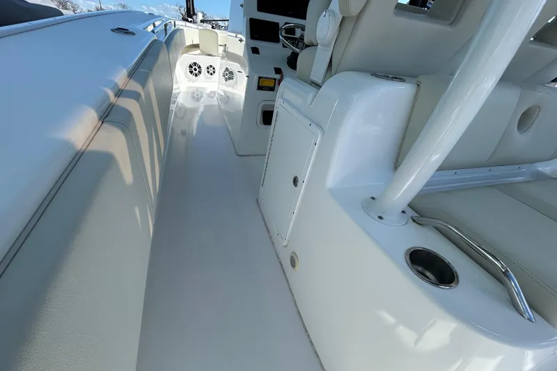 Slide: The Image of 2022 Cape Horn 36 boat interior with white seating and modern design. - 37